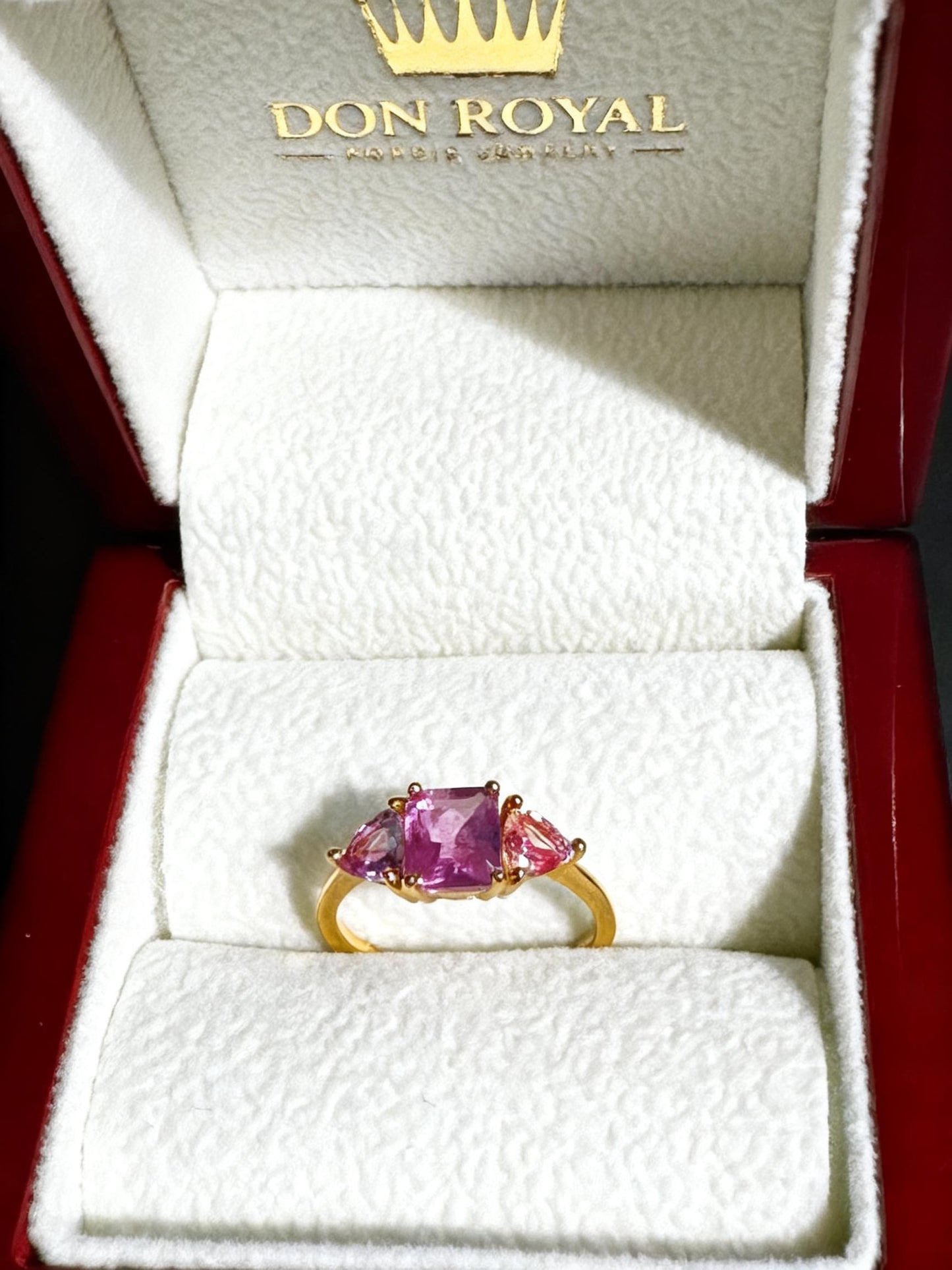 natural pink violet padparadscha sapphire trilogy yellow gold ring