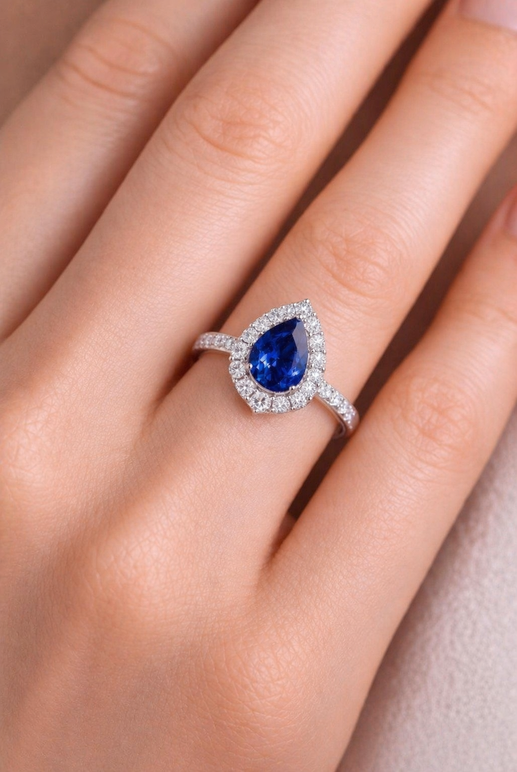 blue sapphire diamond halo gold ring