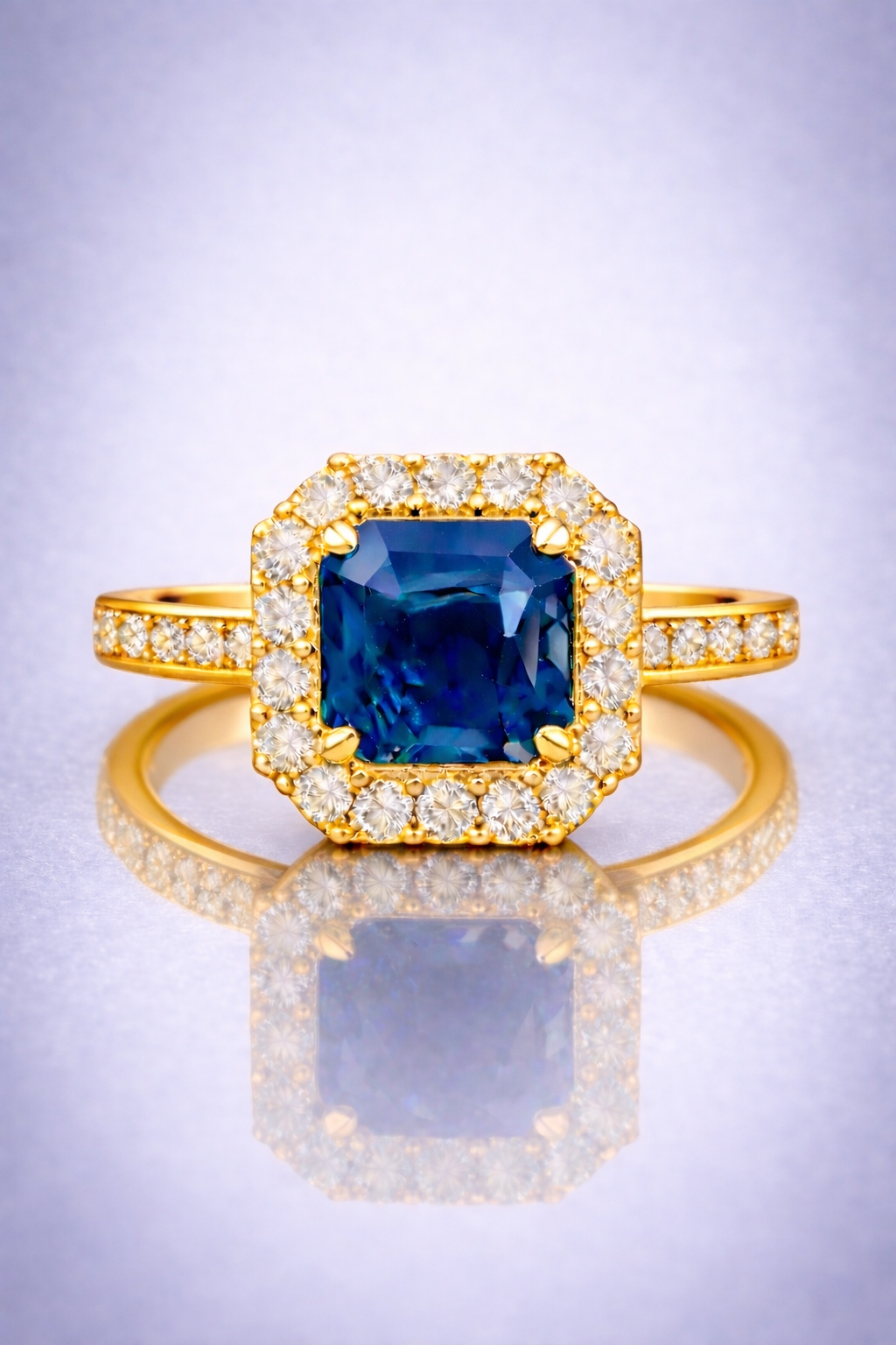 blue sapphire diamond halo yellow gold ring