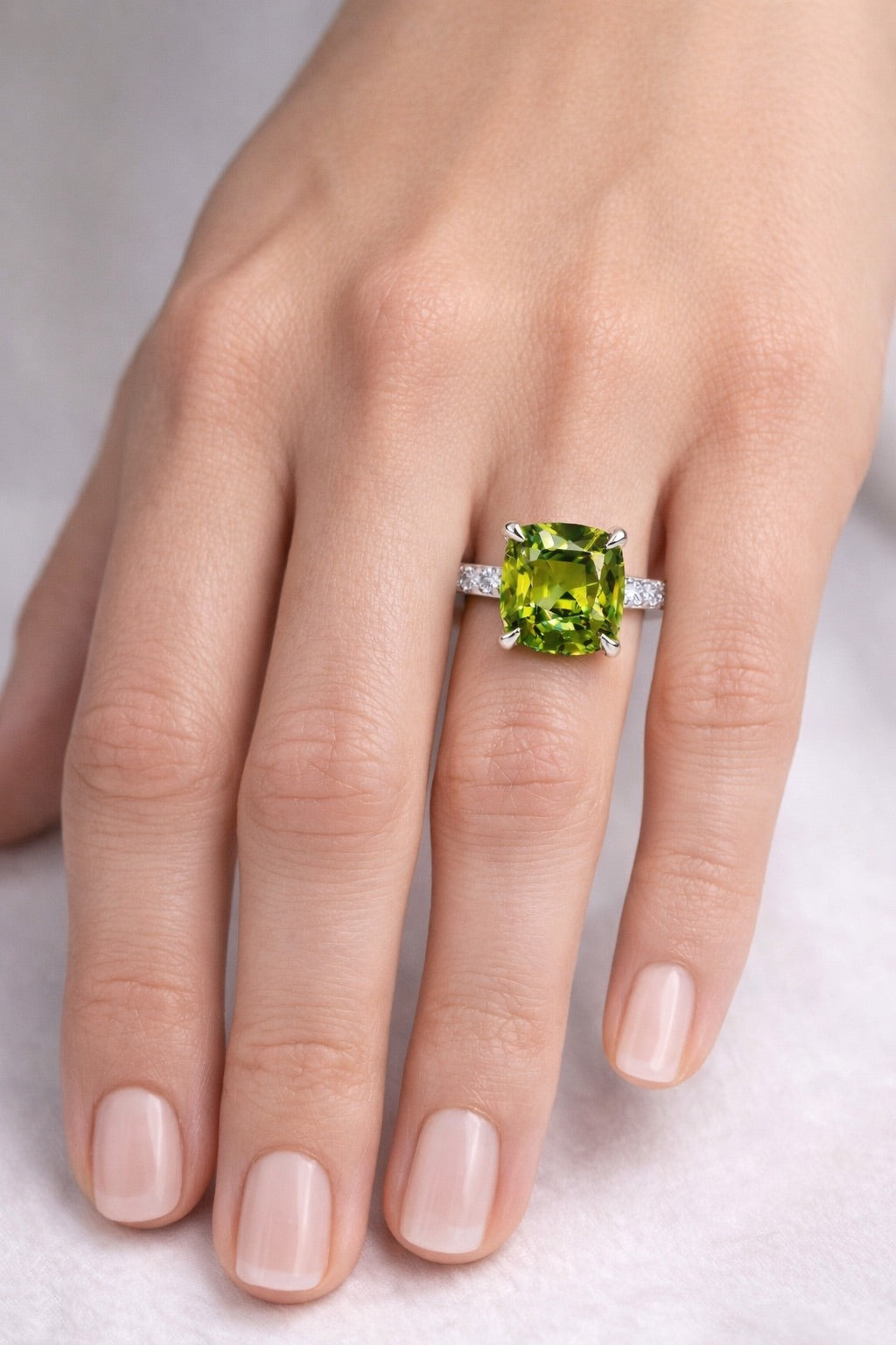 Natural unheated bicolor sapphire and diamond ring in white gold on finger