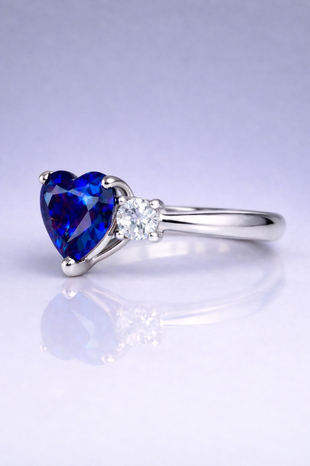 Eternal Heart blue sapphire three-stone ring in white gold side