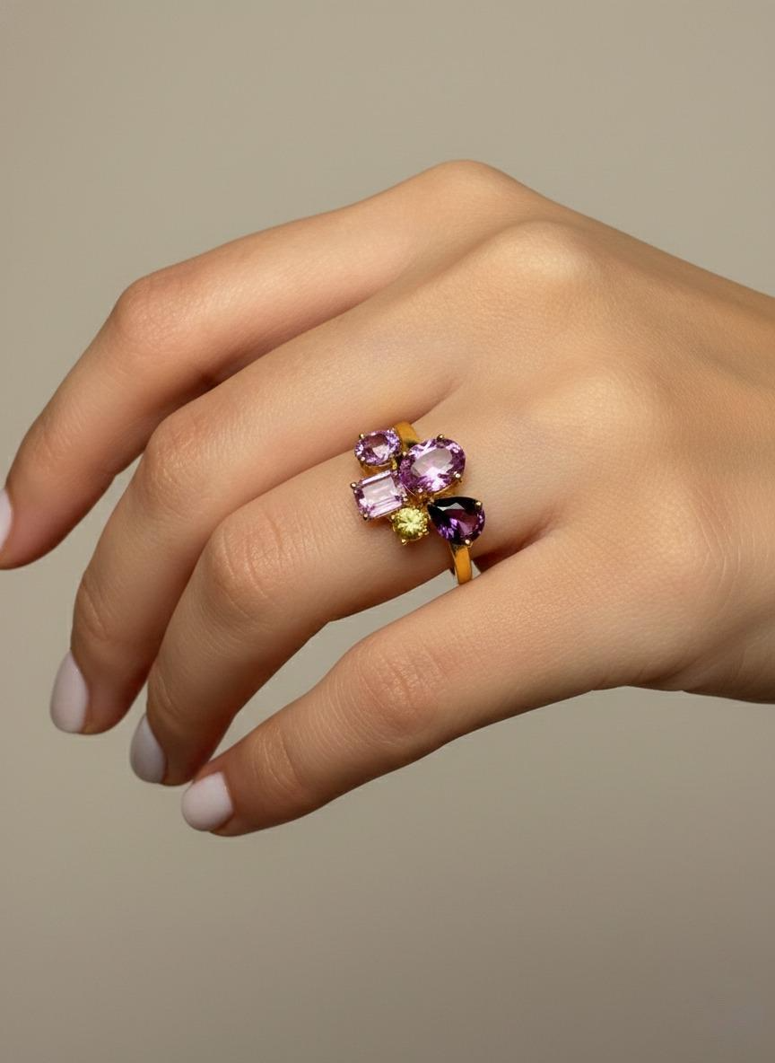 Multicolor sapphire ring worn on finger