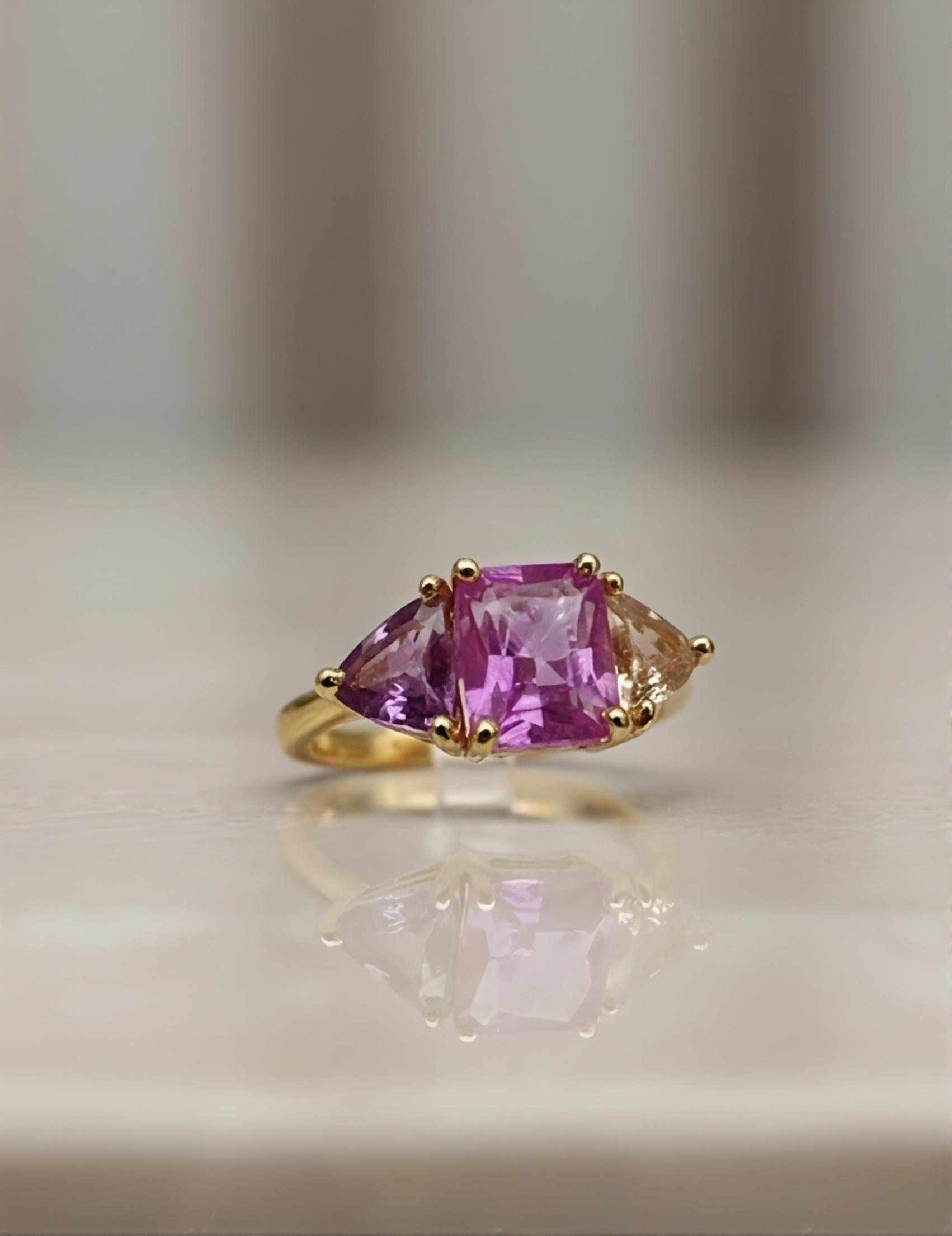 Padparadscha, pink, and purple sapphire gradient ring