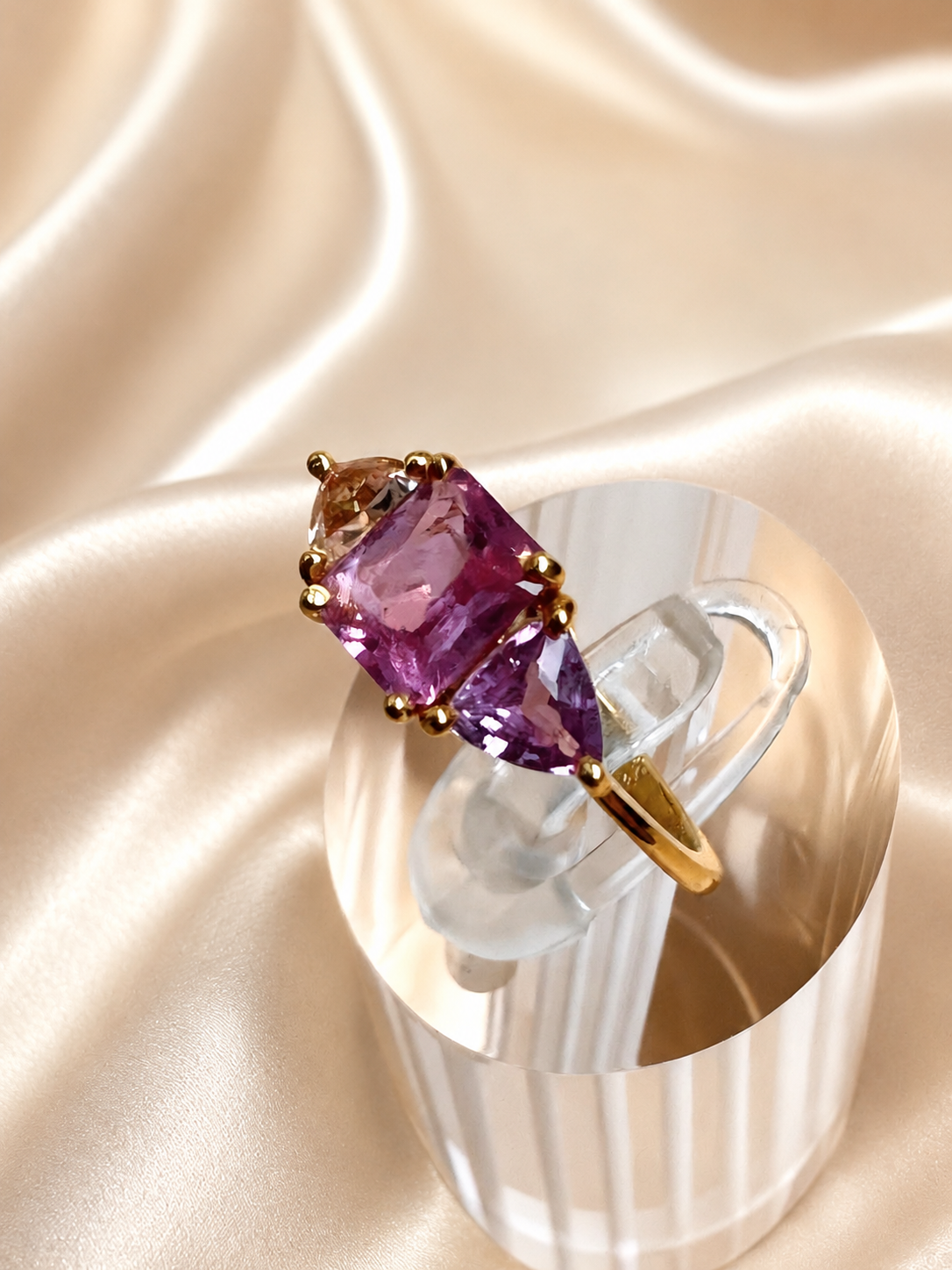 natural pink violet padparadscha sapphire trilogy yellow gold ring