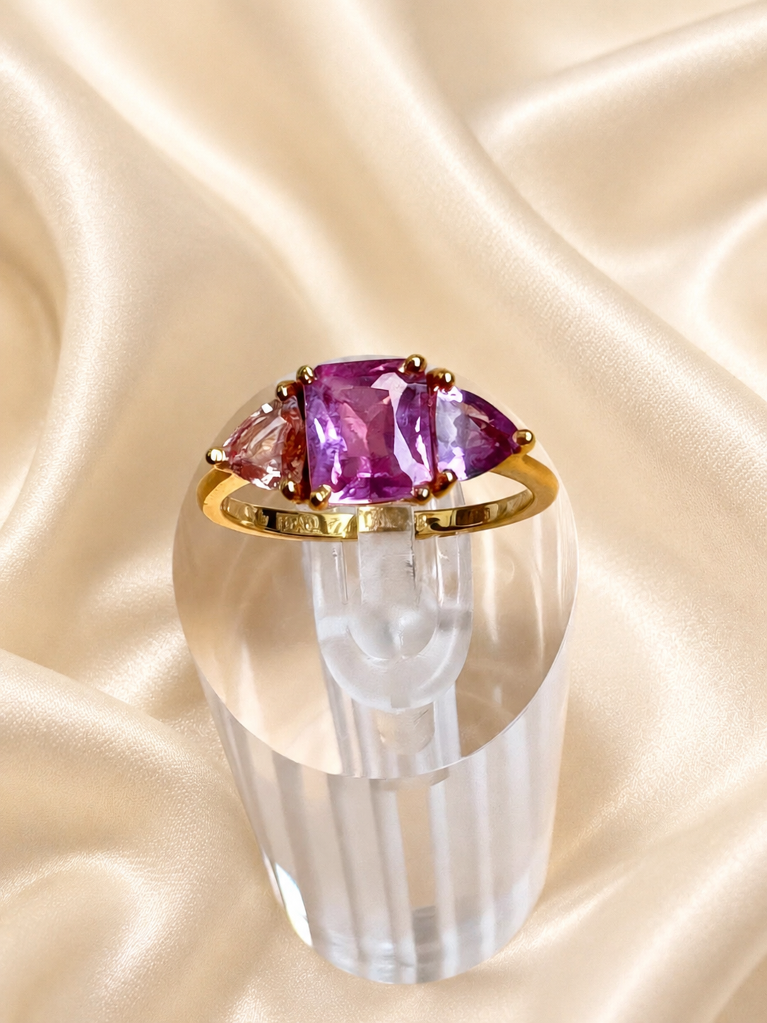 natural pink violet padparadscha sapphire trilogy yellow gold ring