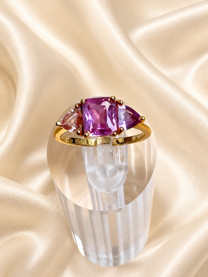 natural pink violet padparadscha sapphire trilogy yellow gold ring