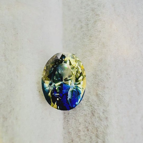 1.74 ct unheated bicolor sapphire certified
