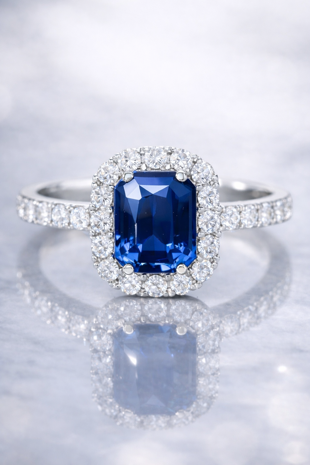 blue sapphire diamond halo white gold ring